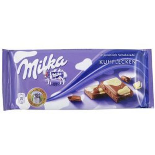 Zoom to enlarge the Milka Chocolate Bar • Happy Cow White & Milk